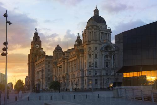 Liverpool fiery sunset with the Port of Liverpool Building and  the Royal Liver Building x