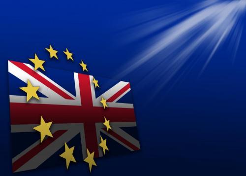 The European Union Flag Stars and Union Jack on a blue background with light rays (1)